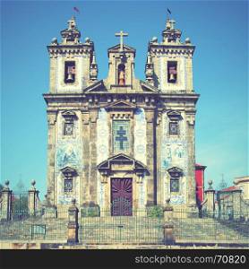 Santo Ildefonso church in Porto, Portugal. Retro style filtered image