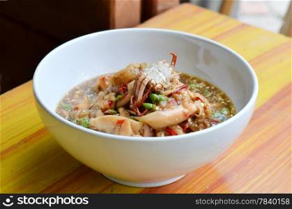 santol salad with steamed crab in white bowl , Thai style food