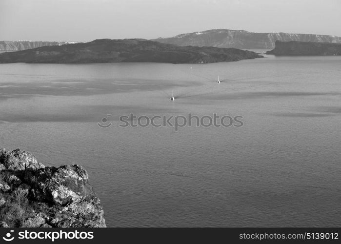 santorini europe greece and dry bush rock alone in the sky