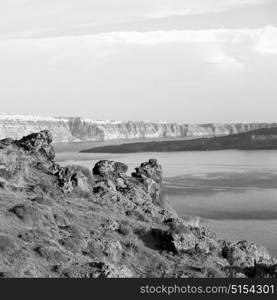 santorini europe greece and dry bush rock alone in the sky