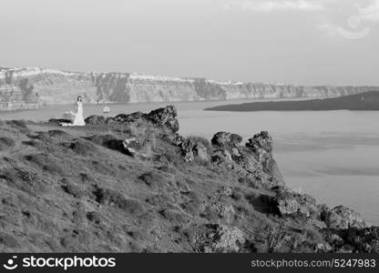 santorini europe greece and dry bush rock alone in the sky