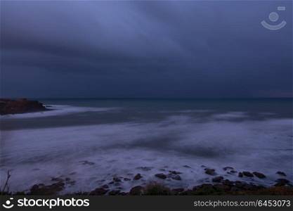 Sao Lourenco beach in Portugal after sunset in a hazzy day