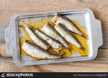 Sardines on the metal plate