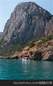Sardinia Coastline: Majestic Rock near Sea, Italy