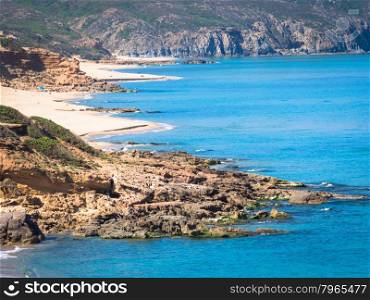 Sardinia wild sunset. Beach in west coast of Sardinia -Arbus - Green Coast