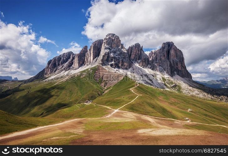 Sassolungo mountain range at sunny day. Dolomites mountains, Italy