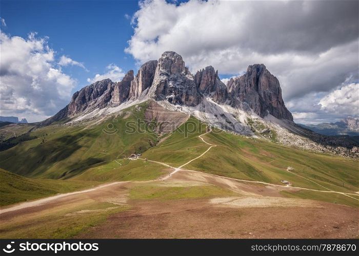 Sassolungo mountain range at sunny day. Dolomites mountains, Italy