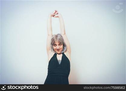 satisfaction and stretching hands woman