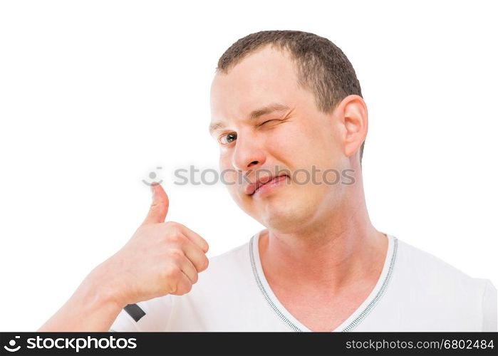 satisfied man makes a gesture with thumb up isolated