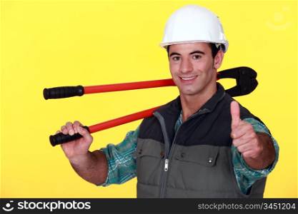 Satisfied workman with thumb up