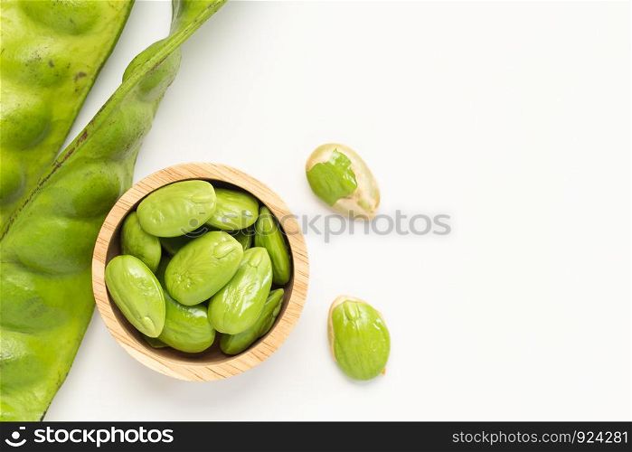 Sato seeds, Bitter bean in the Wooden bowl isolated on white background, Thai vegetable food