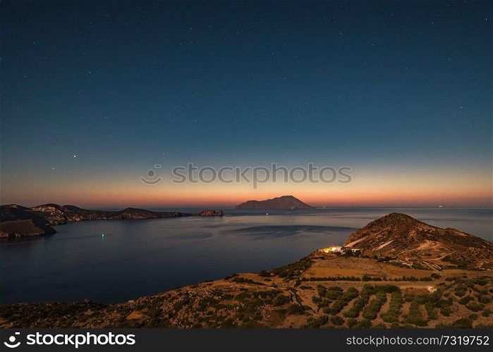 Satrry skys of Greek islands, night landscape of calm Mediterranean sea, romantic place for summer vacation 