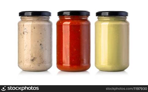 Sauce jars isolated on white background