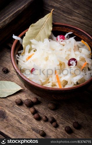 Sauerkraut cabbage salad. sauerkraut with carrots and spices in a bowl