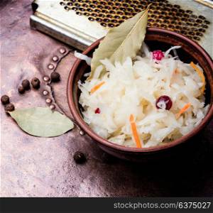Sauerkraut cabbage salad. sauerkraut with carrots and spices in a bowl