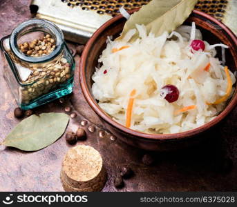 Sauerkraut cabbage salad. sauerkraut with carrots and spices in a bowl