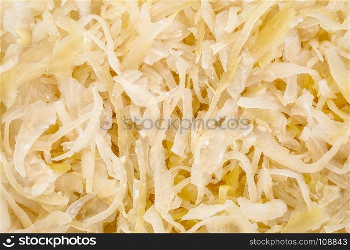sauerkraut (white fermented cabbage) background - top view
