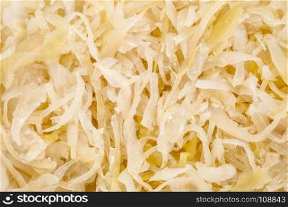 sauerkraut (white fermented cabbage) background - top view