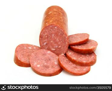Sausage cut by slices on a white background