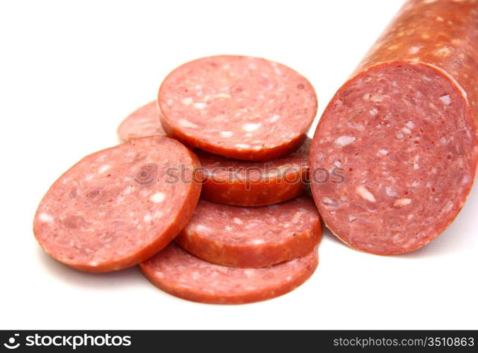 Sausage cut by slices on a white background