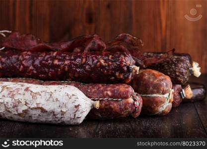 sausage. sausage on a wooden table