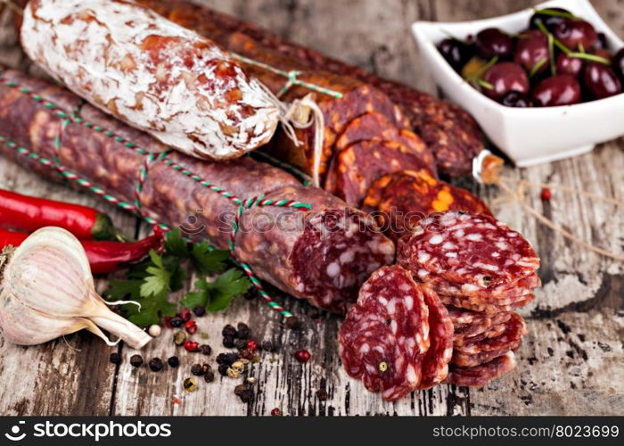 sausage. sausage on a wooden table