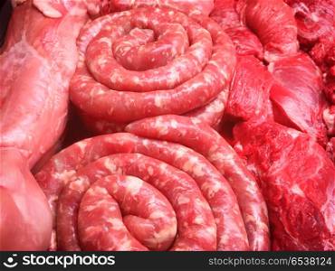 Sausages and beef steaks. Meat with sausages and beef steaks