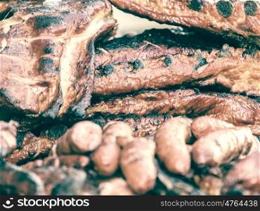 Sausages And Steaks On Barbecue Grill