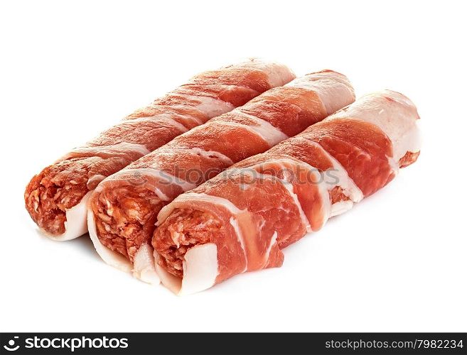 sausages wrapped in bacon, chevapchichi isolated on white background