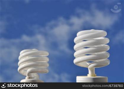 Save energy bulb against sky