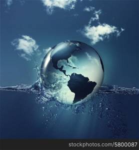 Save the planet. Earth globe on the water waves, abstract natural backgrounds