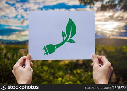 save world ecology concept environmental conservation with hands holding cut out paper power plug showing