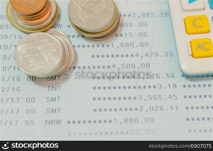 Saving Account Book Bank.Business Finance with calculator and coin.