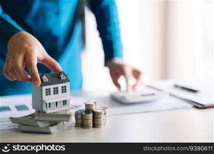 Saving money for Real estate investment with with stack of money coins for buying home and loan for prepare in the future financial insurance concept
