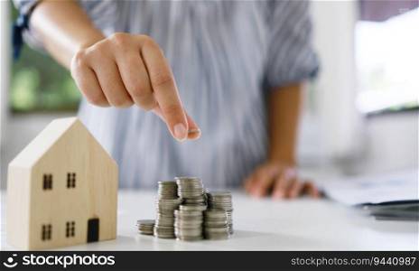 Saving money for Real estate investment with with stack of money coins for buying home and loan for prepare in the future financial insurance 