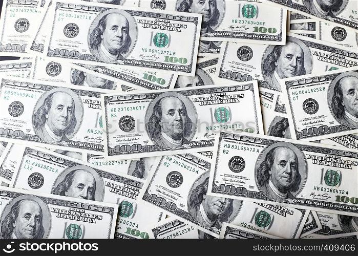 savings - a background of hundred dollar bills