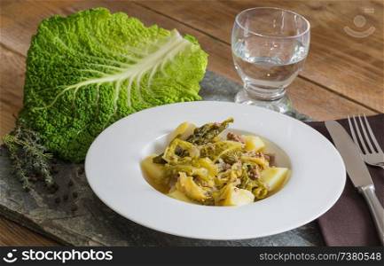 Savoy cabbage stew with potatoes and ground beef.. Savoy cabbage stew with potatoes and ground beef