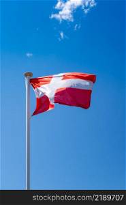 Savoy - Savoie - flag on a blue sky , La Clusaz, France. Savoy - Savoie - flag, La Clusaz, France