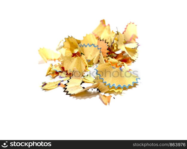 Sawdust shavings of wooden colored pencils from sharpener isolated on a white background, Copy space.