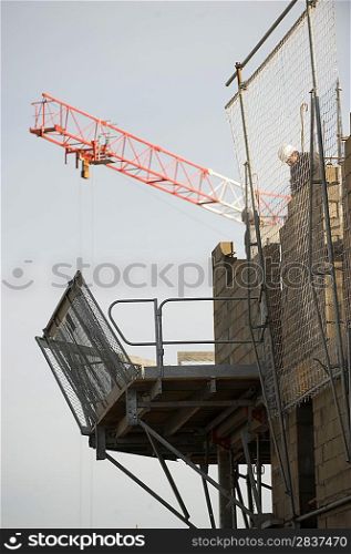 Scaffolding and crane