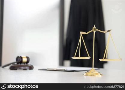 Scales of justice and gavel Judge hammer on brown wooden desk with copy space. Legislation Concept