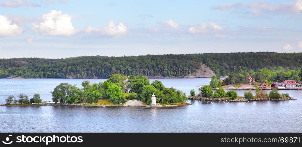 Scandinavian landscape with islands and small lighthouse, Sweden
