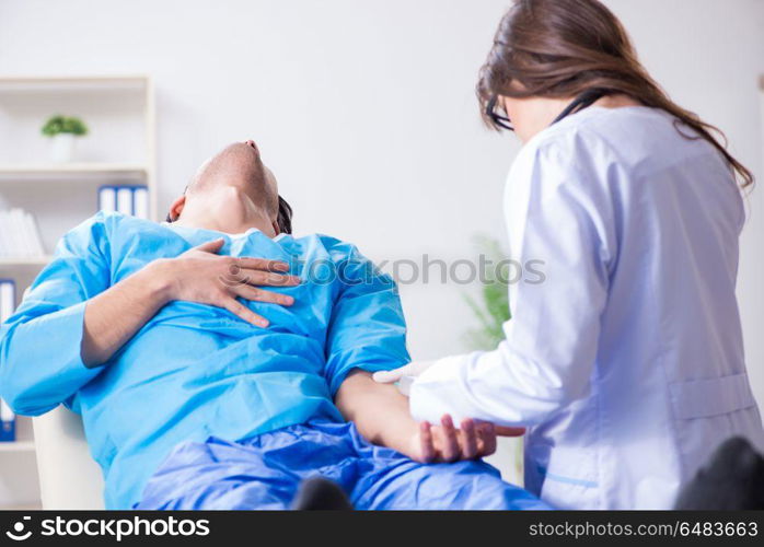 Scared patient man getting ready for flu shot