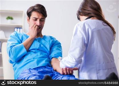 Scared patient man getting ready for flu shot