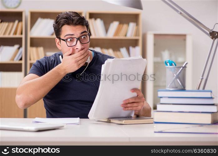 Scared student with paperwork in library