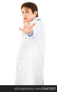 Scared young medical doctor isolated on white background&#xA;