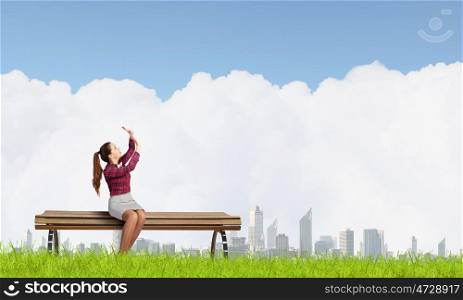 Scarred woman. Young woman sitting on bench afraid of something