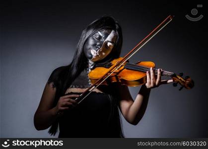 Scary monster playing violing in halloween concept