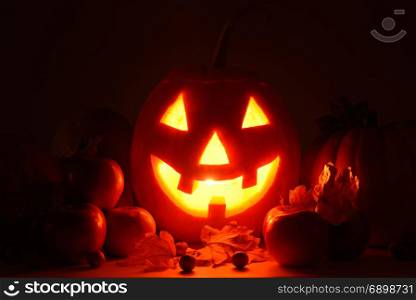 scary pumpkin head with glowing eyes - a symbol of Halloween