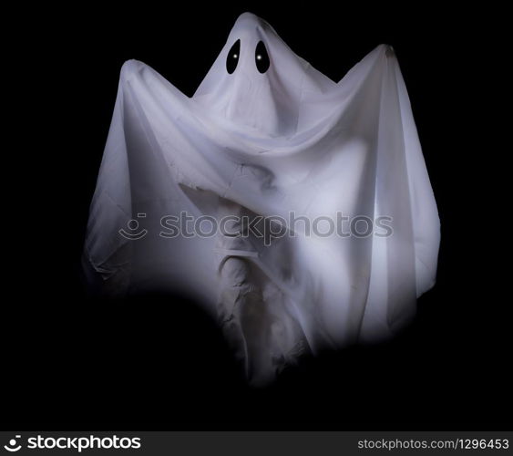 Scary white ghost at big eye on a black background for Halloween concept